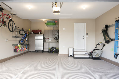 Inspiration for a mid-sized modern attached two-car garage remodel in Chicago