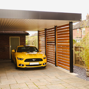 Photo of a mid-sized contemporary attached one-car carport in Other.