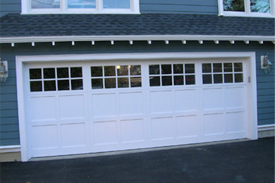 Large traditional attached double carport in Boston.