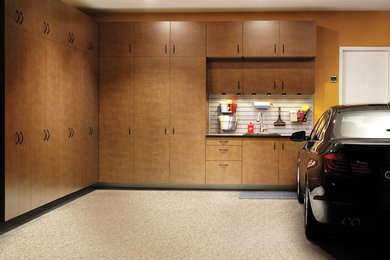 Mid-sized elegant attached two-car garage photo in Cleveland