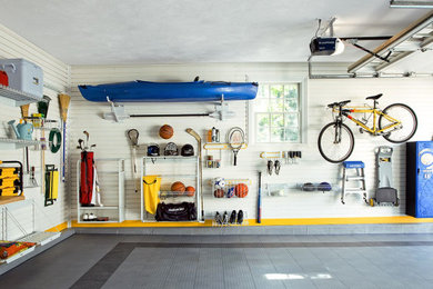 Carport - large industrial attached two-car carport idea in Chicago