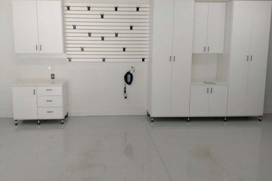 Example of a minimalist garage design in Other