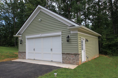 Garage workshop - mid-sized traditional detached two-car garage workshop idea in DC Metro