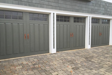 Design ideas for a medium sized modern garage in Baltimore with three or more cars.