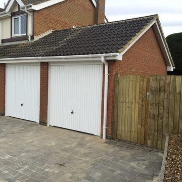 Garage extension with block paved driveway