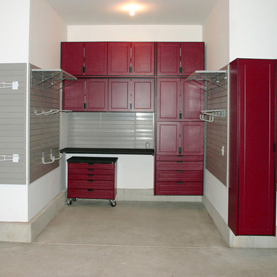 Mid-sized transitional attached two-car garage workshop photo in Kansas City