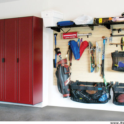 Mid-sized transitional attached two-car garage workshop photo in Kansas City