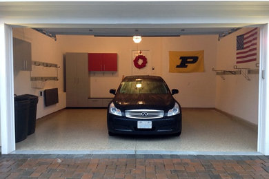 Mid-sized elegant attached two-car garage photo in Boston