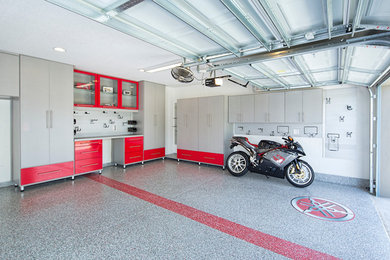 На фото: гараж среднего размера в современном стиле для двух машин