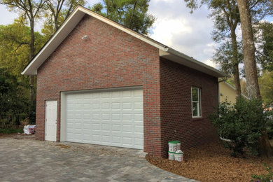 Example of a transitional garage design in Jacksonville