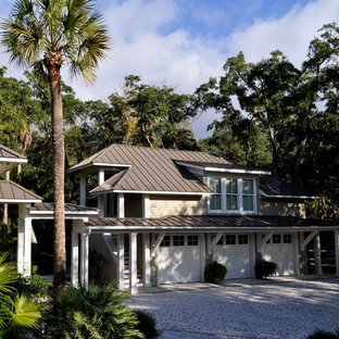 Inspiration for a large timeless detached three-car garage remodel in Atlanta