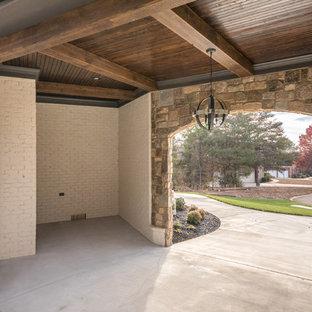Inspiration pour un garage pour deux voitures attenant craftsman de taille moyenne avec une porte cochère.