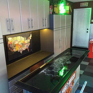 Inspiration for a mid-sized attached two-car garage remodel in Other