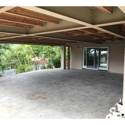 Inspiration for a large tropical attached three-car carport remodel in Hawaii
