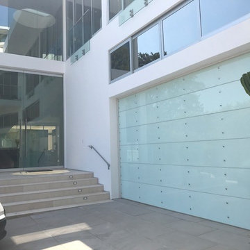 Hollywood Hills custom commercial glass roll up garage doors