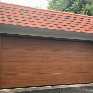 Hormann LPU42, L-Ribbed, Steel Sectional Garage Door in Golden Oak