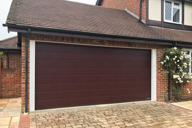 This is an example of a modern garage in Other.