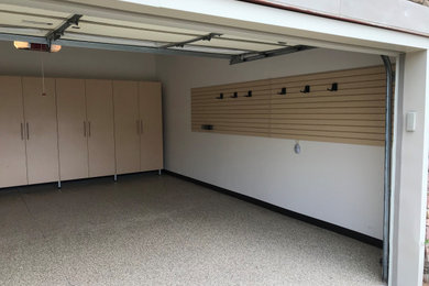 Photo of a medium sized classic attached double garage in Other.