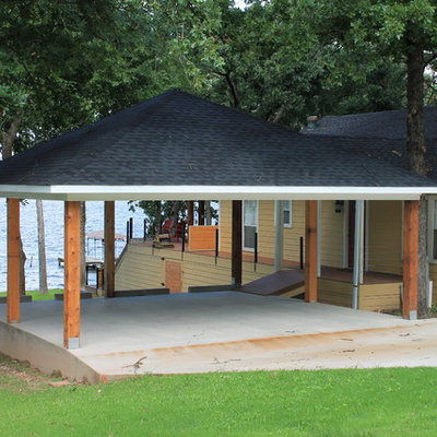 Carport - large coastal detached two-car carport idea in Dallas