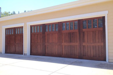 Photo of a medium sized traditional attached garage in San Francisco with three or more cars.
