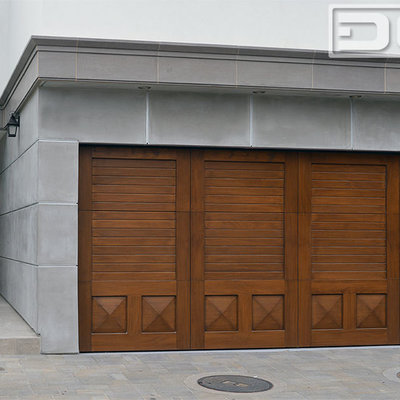 Garage - large transitional two-car garage idea in Orange County