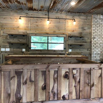 Man Cave Garage Remodel - rustic weathered wood, custom light fixture, & open sh