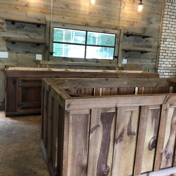 Man Cave Garage Remodel- weathered wood stain, open shelving, rustic cabinets