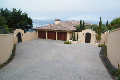 Large tuscan attached three-car garage photo in San Francisco