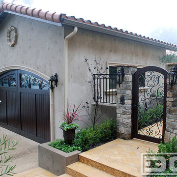 Mediterranean Garage Door & Pedestrian Gates | Ferrari Drive in Beverly Hills CA