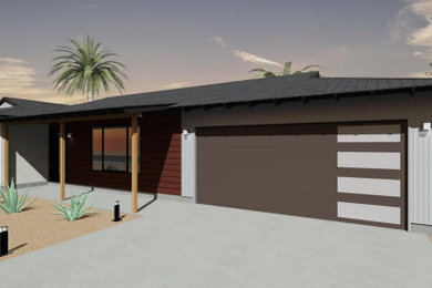 Garage - mid-sized mid-century modern attached two-car garage idea in Phoenix