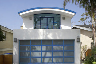 Foto de garaje adosado moderno para dos coches