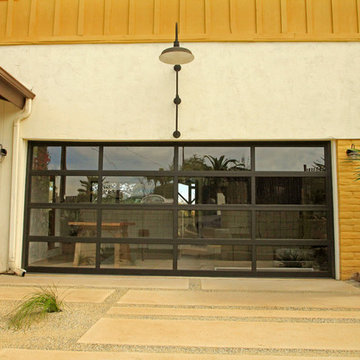 Modern Garage: glass overhead doors