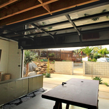 Modern Touch: Glass overhead door for converted garage