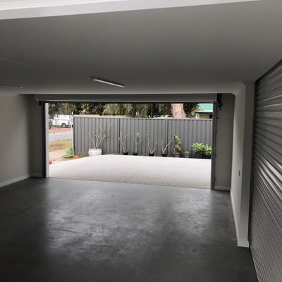 Carport - small modern attached two-car carport idea in Perth