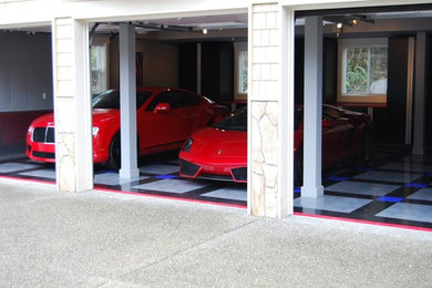 Imagen de garaje adosado moderno grande para tres coches
