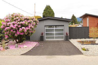 Photo of a contemporary garage in Vancouver.