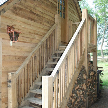 Oak stairs with log store