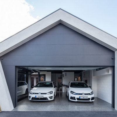 Mid-sized trendy attached two-car carport photo in Melbourne