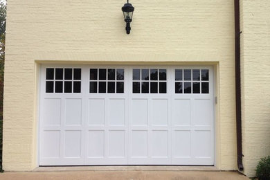 Inspiration for a mid-sized timeless attached two-car garage remodel in DC Metro