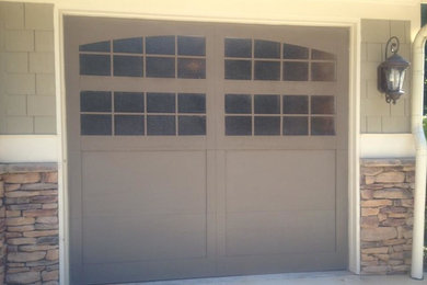 Example of a minimalist detached one-car garage design in Atlanta