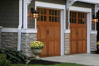 Inspiration for a mid-sized craftsman attached two-car garage remodel in Charleston