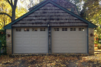 Medium sized traditional detached double garage in Minneapolis.