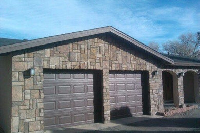 Example of an arts and crafts garage design in Albuquerque
