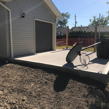 Rear garage door to back pad for trailer storage or entertaining.