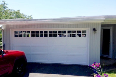 Carport - large traditional attached two-car carport idea in Boston