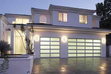 Large modern attached garage in Orange County with three or more cars.