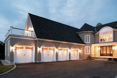 Inspiration for a large coastal attached carport in Orange County with four or more cars.