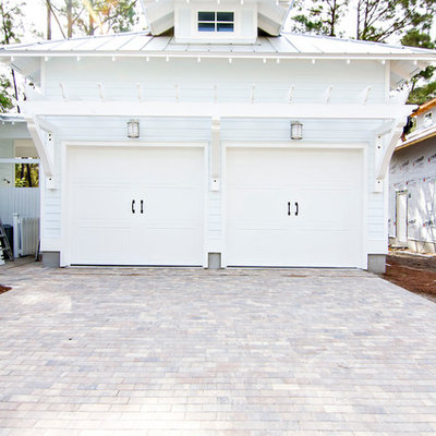 Large beach style detached two-car carport photo in Jacksonville