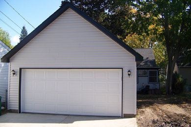 Exemple d'un garage pour deux voitures séparé chic de taille moyenne.