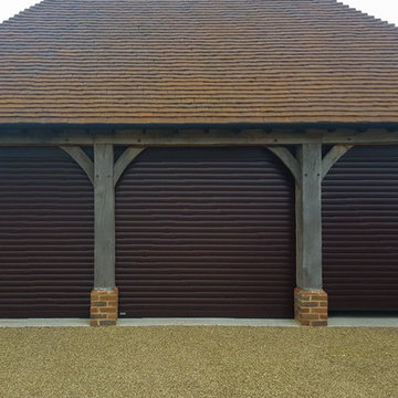 SWS Securoglide Roller Garage Doors in a Rosewood Woodgrain